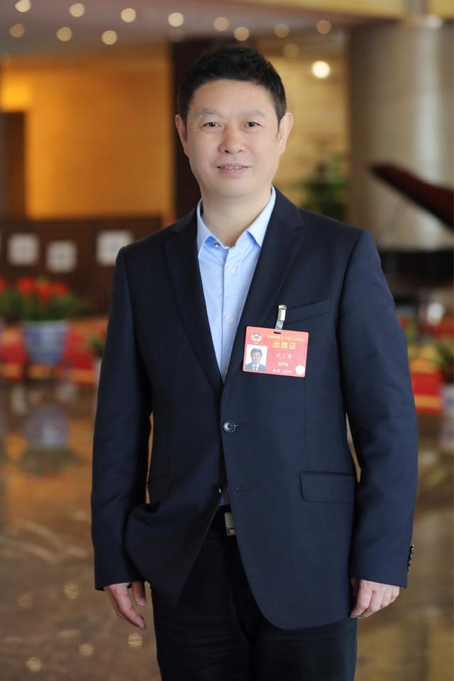 全國政協(xié)委員、民建河北省委副主委、河北經(jīng)貿大學副校長武義青.jpeg