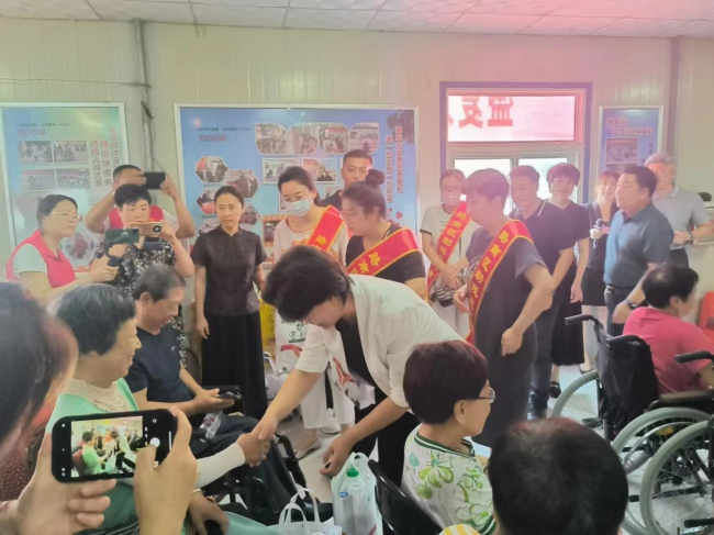 盛夏送濃情，攜手助殘行4.jpg