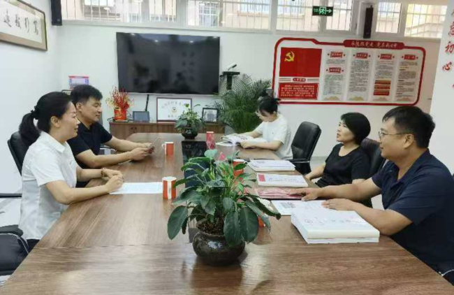 開平區委常委、統戰部長走訪民建唐山市委開平區工委會員單位1 (2).jpg